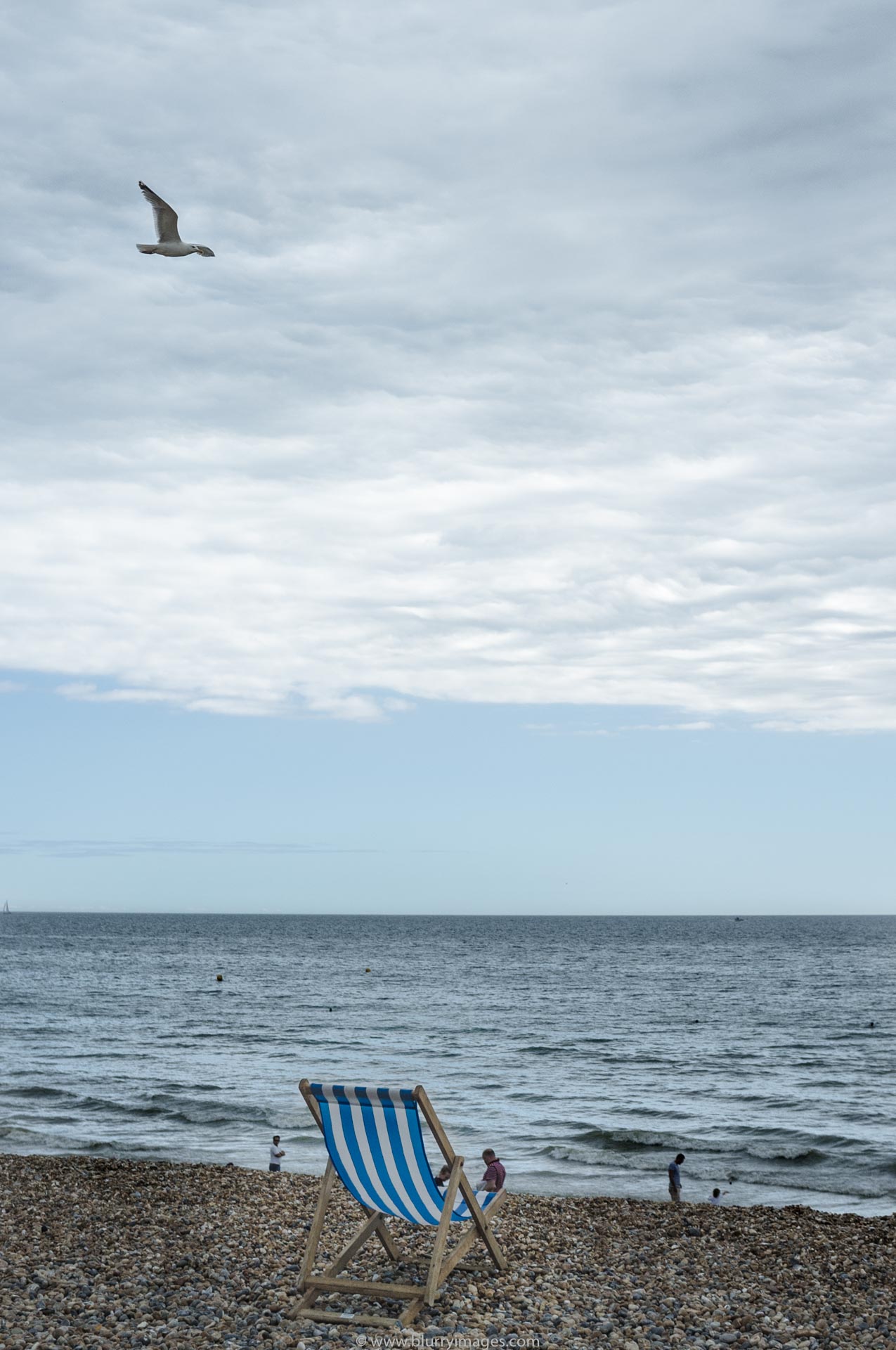 weekend in Brighton, lawn chair in the beach