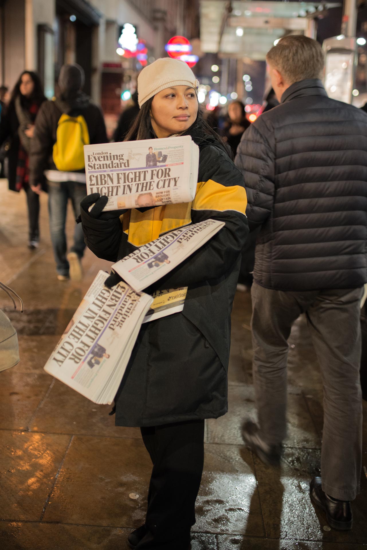 Woman with newspapers, Evening Standard newspaper,